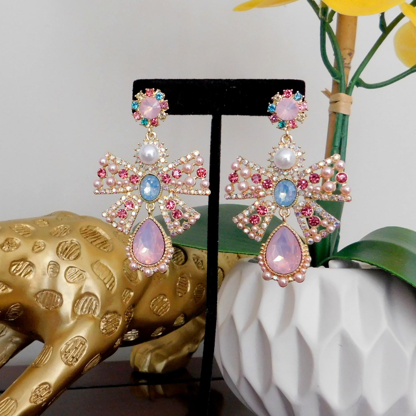Baroque Pink Crystal Rhinestone Bow Tie Stud Earrings with pearl detailing